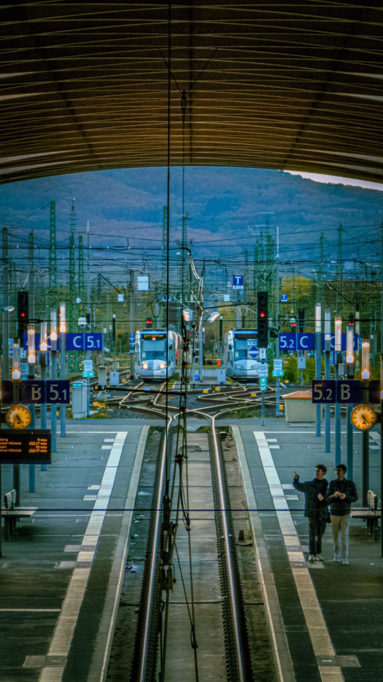 train station with tracks and platforms.